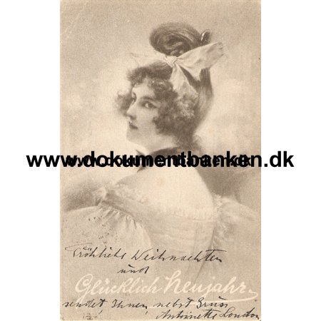 strig. Kvinde. Postkort. 1902
